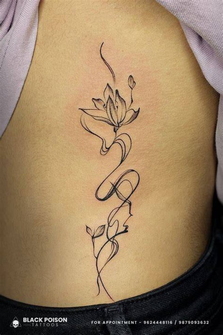 Enchanting Floral Rib Tattoos: A Symphony Of Delicate Designs